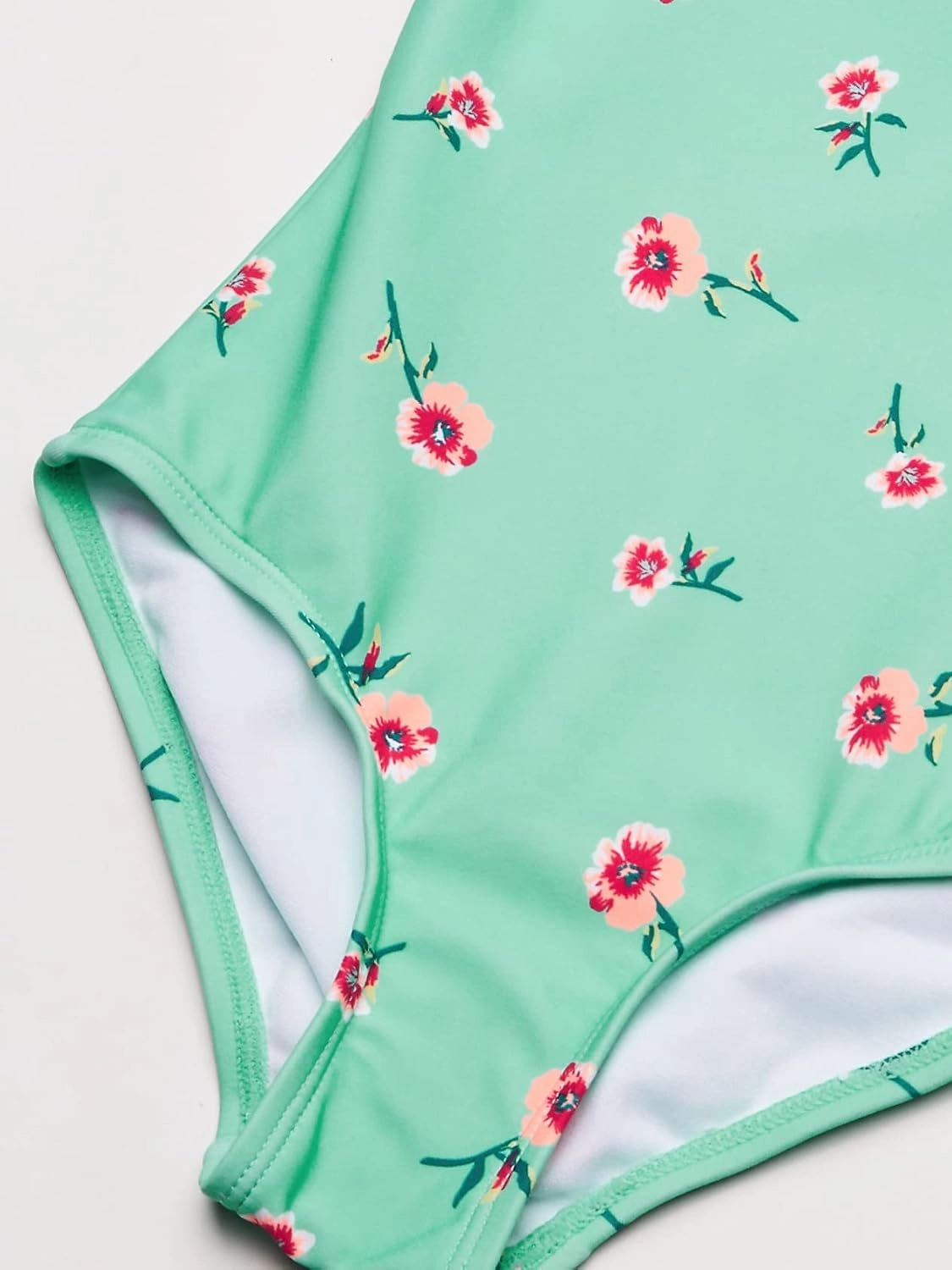 Kanu Surf Girls' Morgan Floral Ruffle 1-Shoulder one Piece Swimsuit