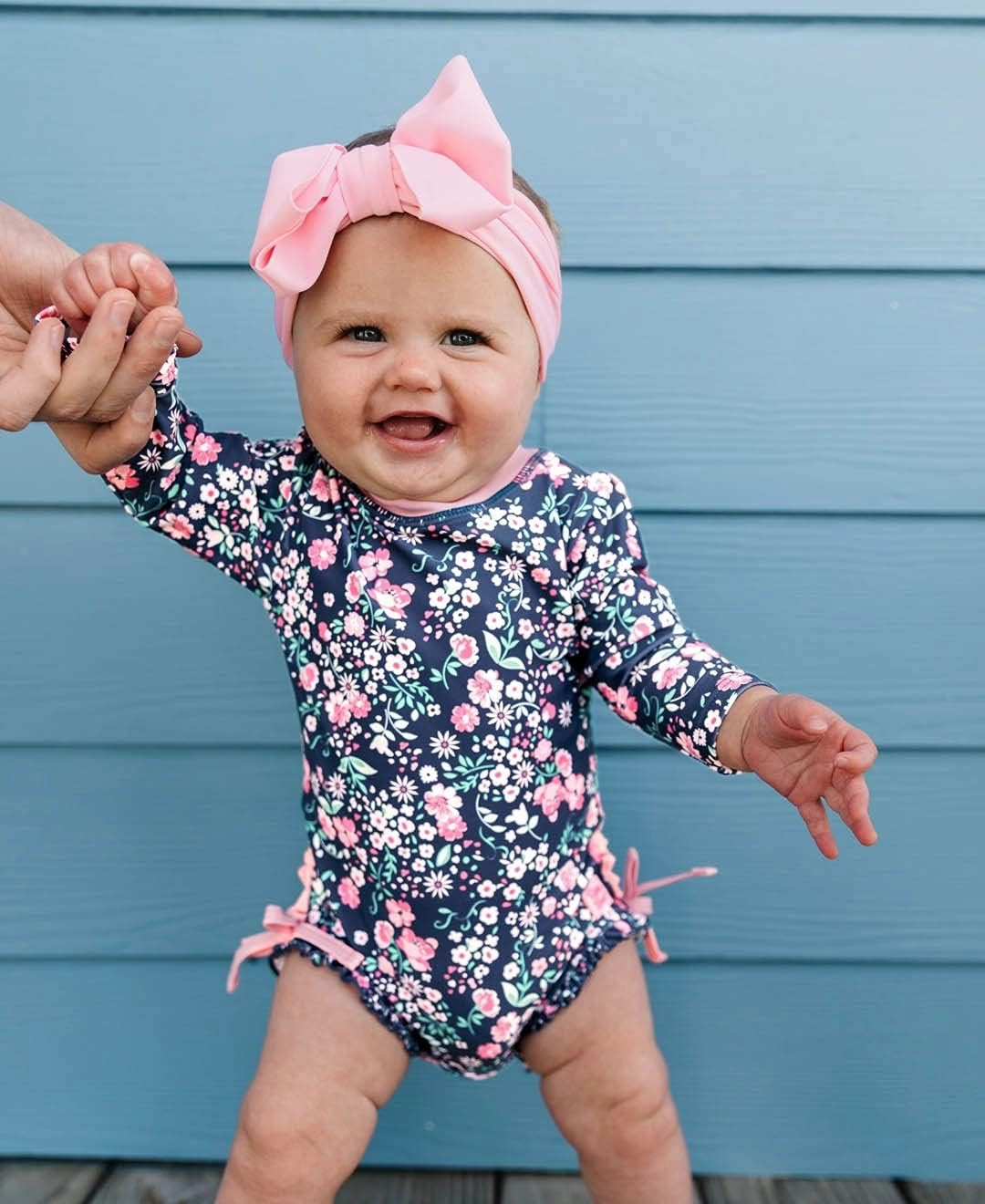 RuffleButts Baby Girls UPF 50  Sun Protection Floral Printed Long Sleeve One Piece Rash Guard Swimsuit with Zipper
