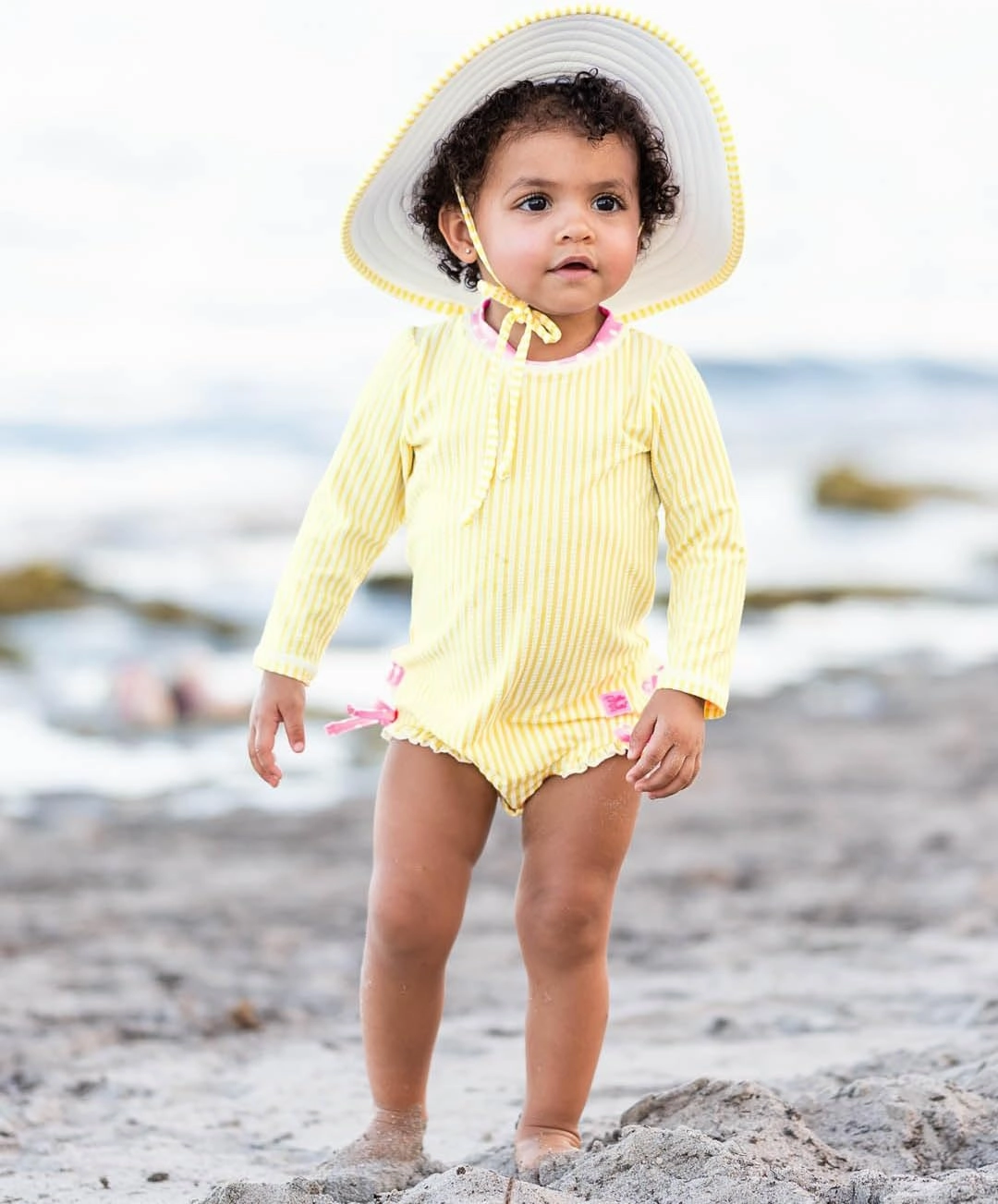 RuffleButts Baby/Toddler Girls Seersucker Long Sleeve One Piece Rash Guard Swimsuit with UPF 50  Sun Protection