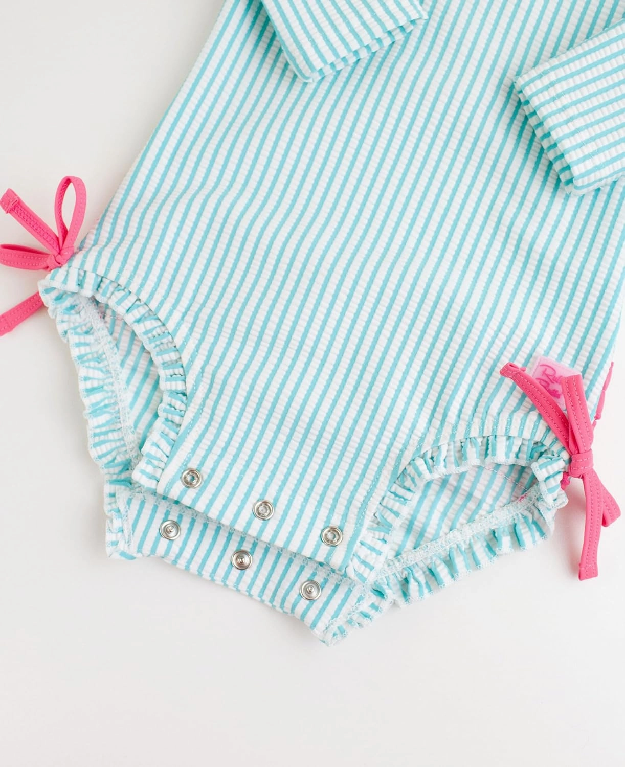 RuffleButts Baby/Toddler Girls Seersucker Long Sleeve One Piece Rash Guard Swimsuit with UPF 50  Sun Protection